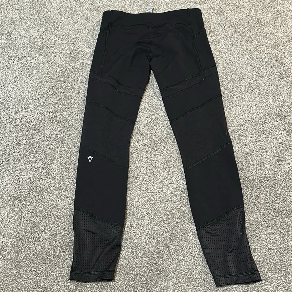 Ivivva by Lululemon black leggings with mesh and cutouts‎ girls size 12